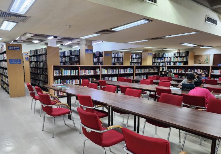 Studying abroad without a financial burden - students in a university library
