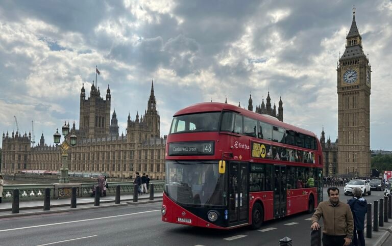 Living cost in UK for Indian students - London bus on Westminster Bridge