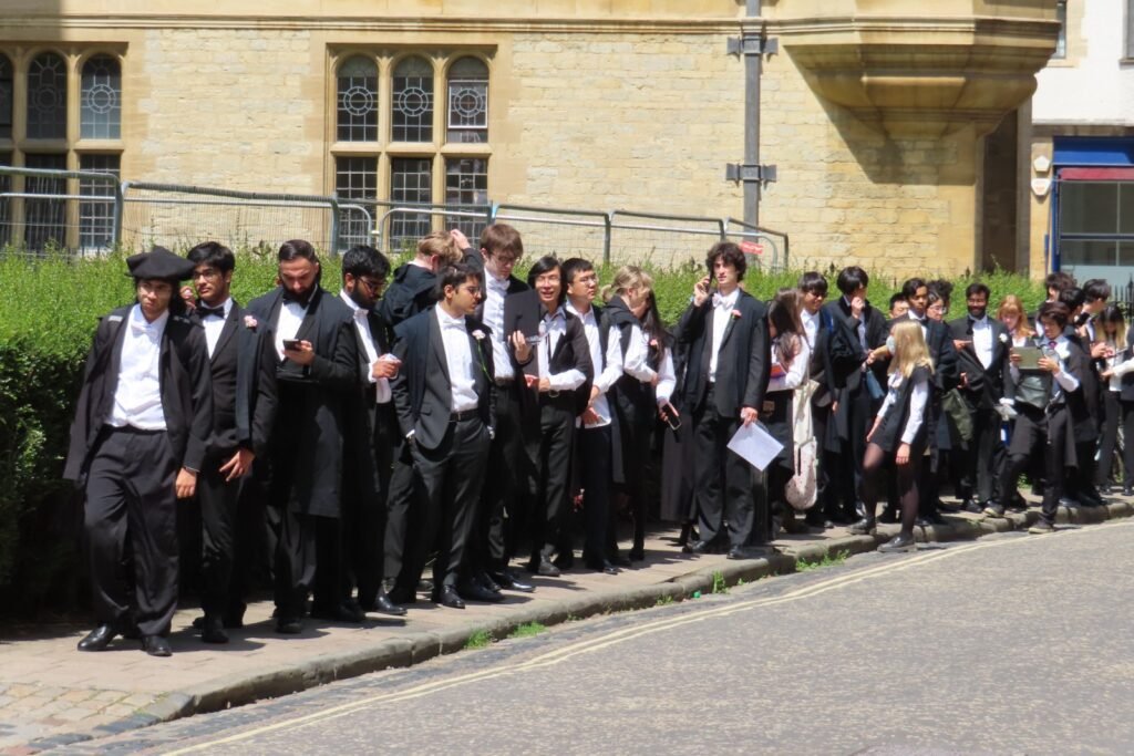 Students waiting to sit exams at the University of Oxford, for the guide to the IELTS score for masters abroad